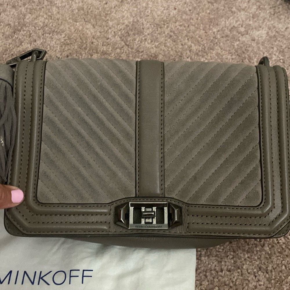 Slate gray tasseled bag by Rebecca Minkoff